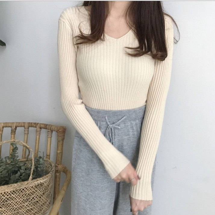 Picture of 2024 Korean Style V Neck Core-Spun Yarn Slimming Look Knitted Long-Sleeved Slim Tight Warm Bottoming Shirt Top Sweater for Women