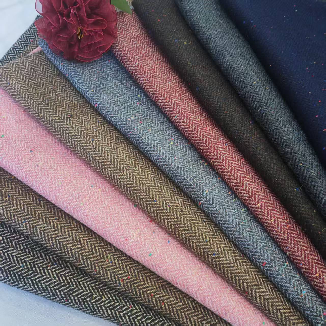 Shaoxing manufacturer spot autumn and winter wool color dot herringbone coat wool suit fashion shoes and hats bags coarse woolen fabric