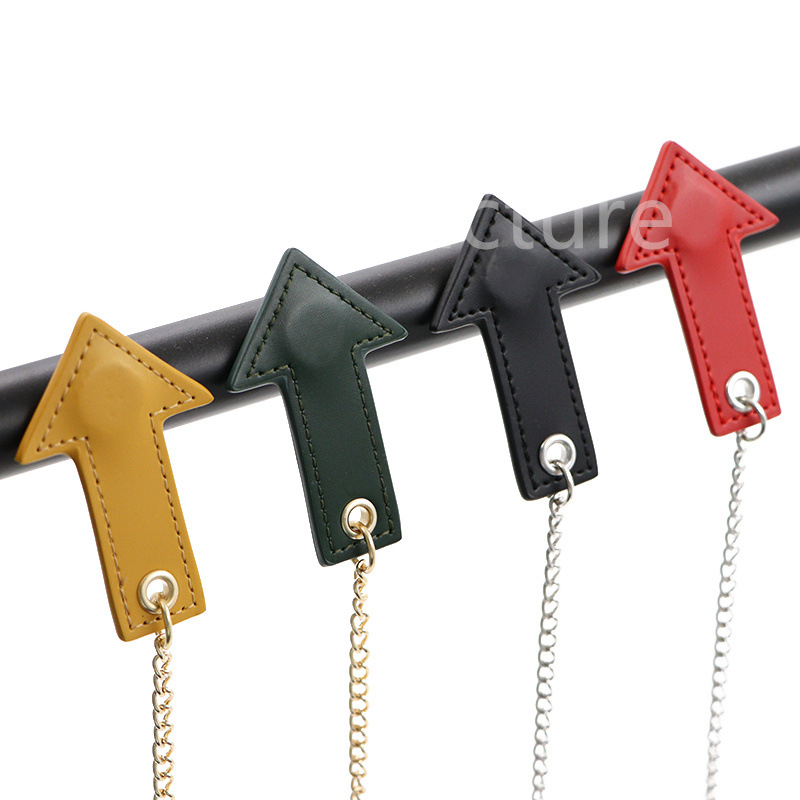 Picture of Golf ball nail mark Arrow direction marker ball seat leather cover golf ball nail anti-lost magnetic lanyard key chain