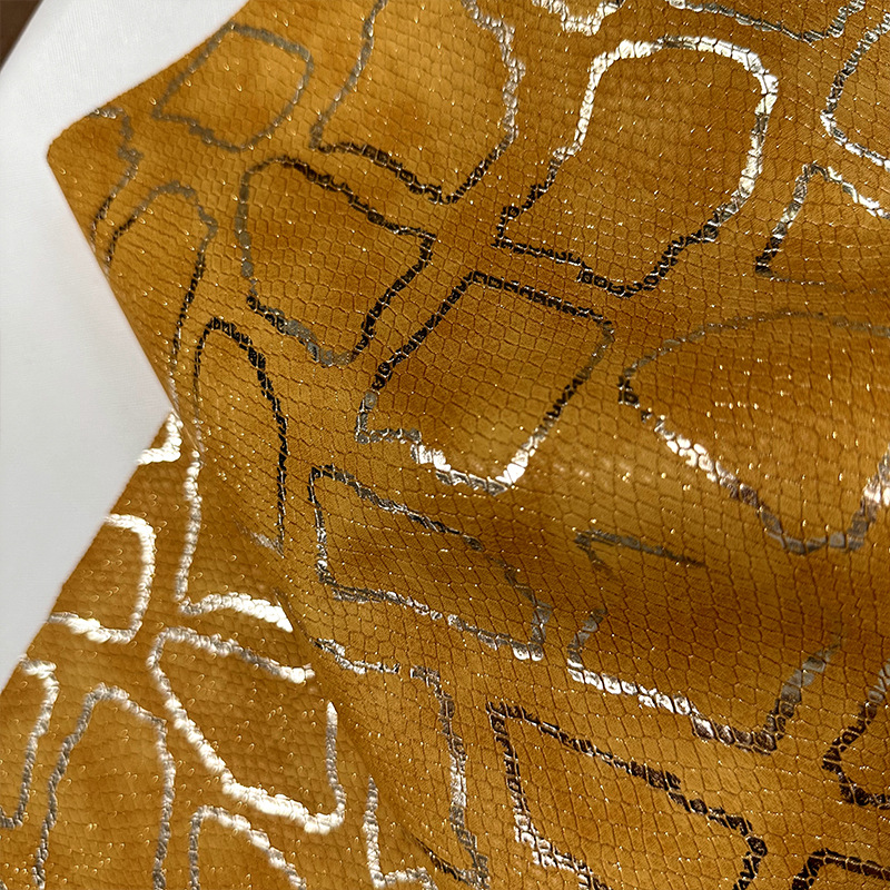 Picture of Metal Cut Hot Snake Gold Silk Pearlescent Embossed PU Imitation Cotton Fleece Material for Shoes Bag Double Color Black Leather Fabric