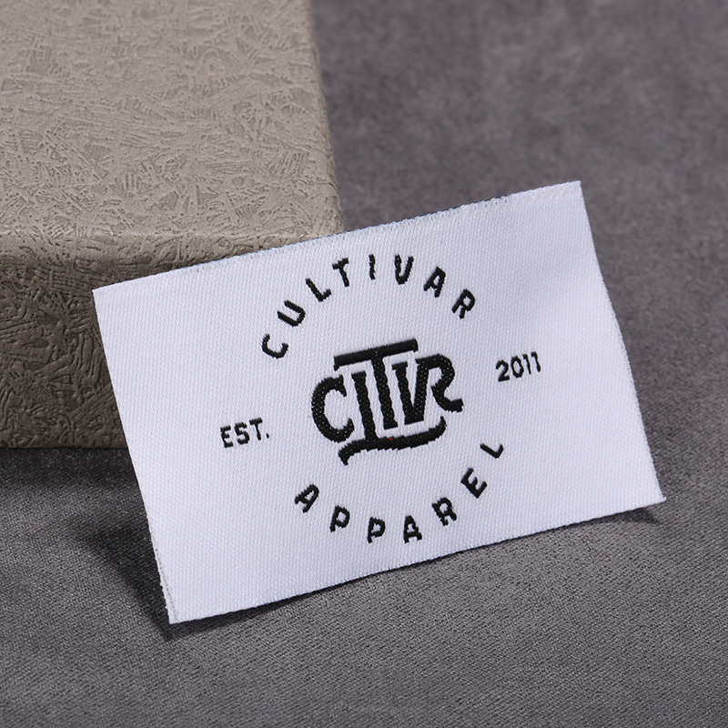 Picture of Manufacturers supply all kinds of woven marks, collar marks, clothing accessories, trademarks, logo woven marks, folded letters, sizes, washed marks