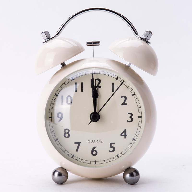 Picture of European-style retro pointer desk clock metal creative bell alarm clock desktop mute student night light quartz desk clock