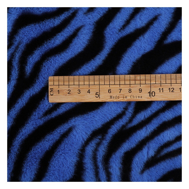 Rabbit fur brushed plush blanket fabric 300g polyester printed zebra pattern imitation rabbit fur rabbit fur fabric