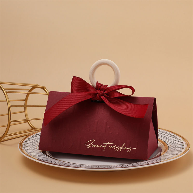 Picture of Light luxury champagne hand-held triangle wedding candy box wooden ring hand gift box wedding candy box wholesale