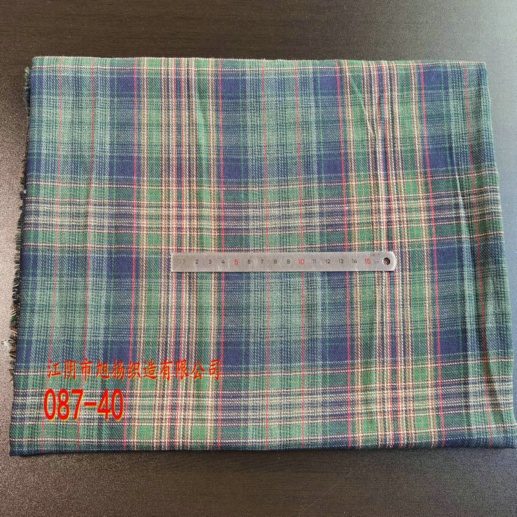 Picture of in stock brushed plaid fabric spring and summer women's shirt cloth 21 polyester cotton woven flannel plaid lining