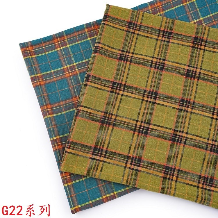 Picture of 140g Yarn-Dyed Plaid Woolen Fabric in Stock Wholesale 21S Yarn-Dyed Twill Brushed Plaid Shirt Fabric Ins Flannel