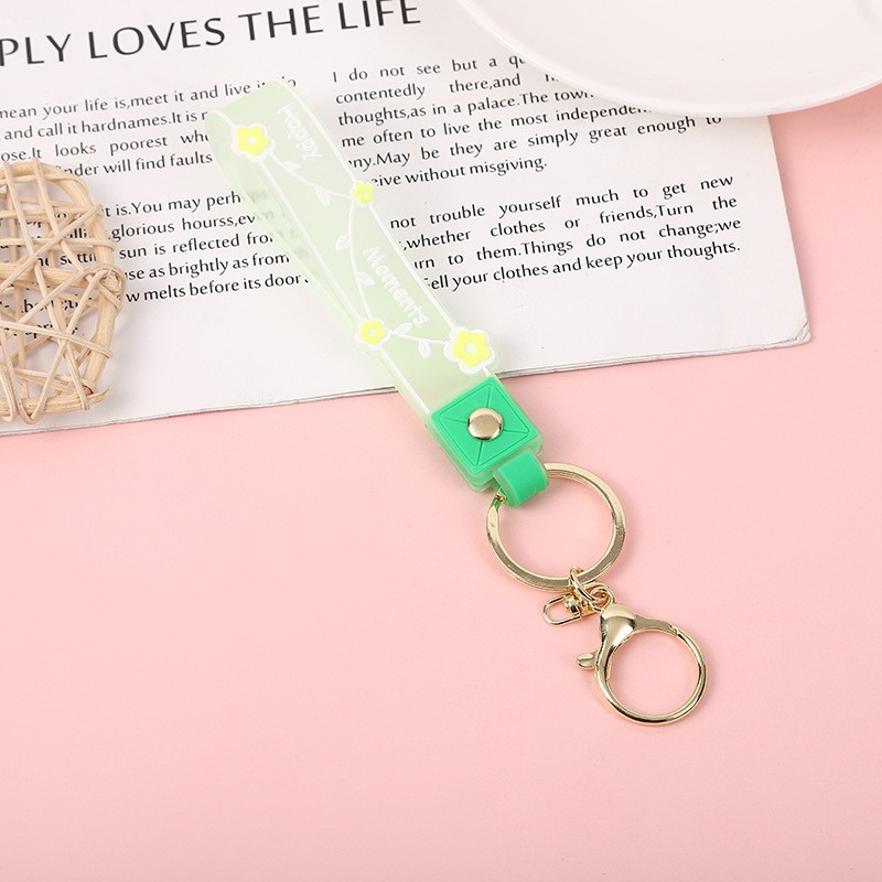 Picture of Transparent candy color soft rubber leather rope keychain small fresh flower creative small accessories cute women's exquisite hand strap