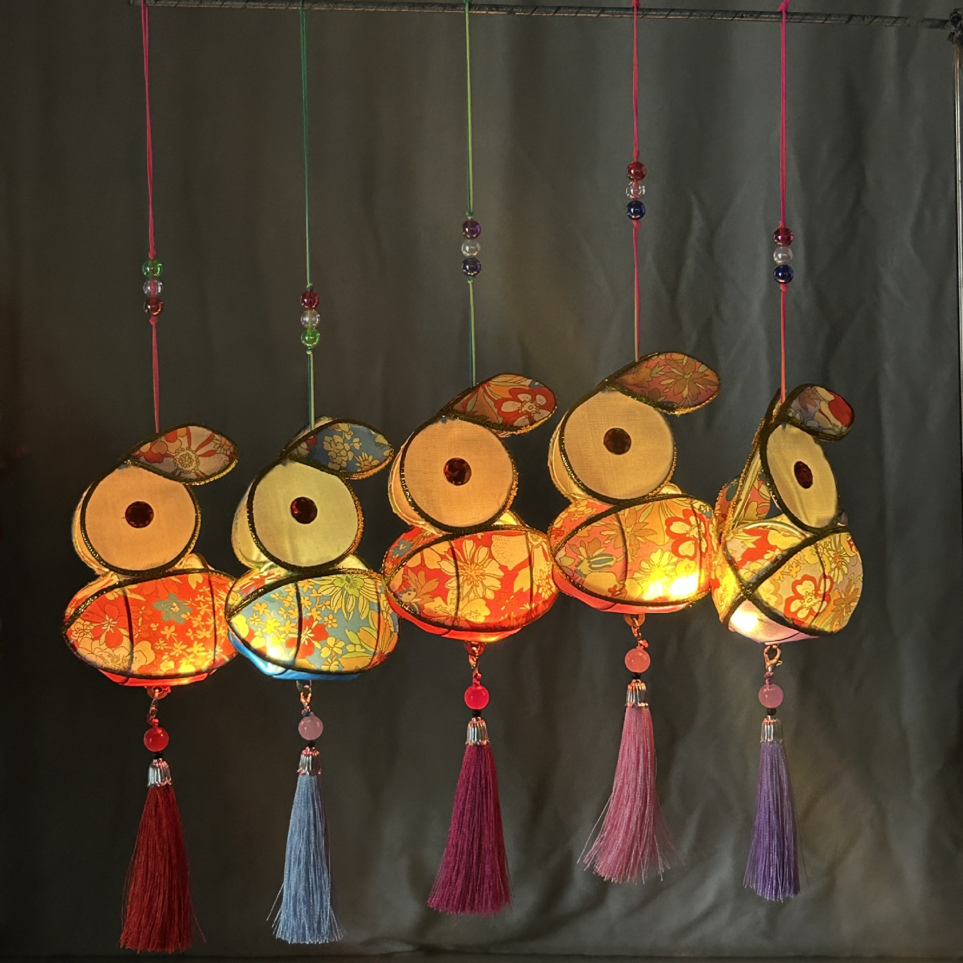 Picture of Traditional Handmade Lanterns for Spring Festival Lantern Festival Portable Iron Silk Cloth Luminous Mini Rabbit Lantern