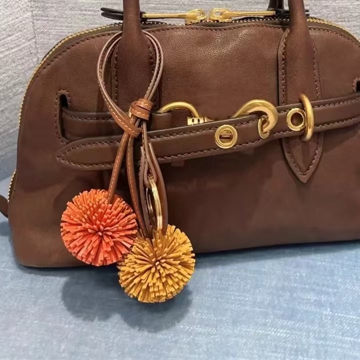 New M Advanced Tassel Ball Bag Pendant Super All-match Brown Hand-woven Backpack Hanging Buckle Correct Word