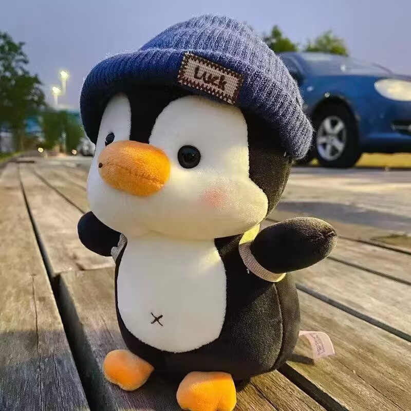 Picture of Backpack travel penguin doll plush toy grab doll doll children's day female birthday gift items wholesale