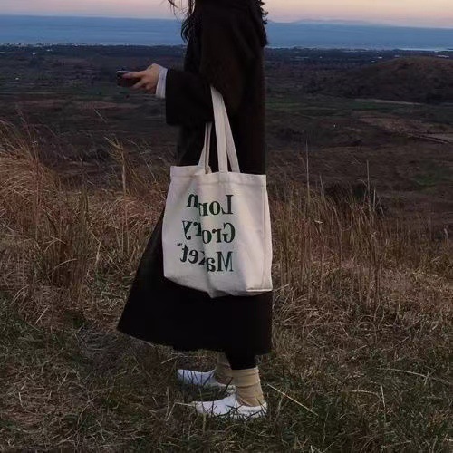 Picture of New Large Capacity Letter Zipper Shoulder Bag Canvas Bag Women's Retro Artistic Simple Student Commuter Tote Bag