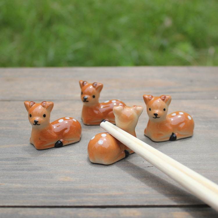 Picture of Ceramic crafts ornaments 12592 deer chopsticks rack sika deer chopsticks rack pen rack factory direct wholesale