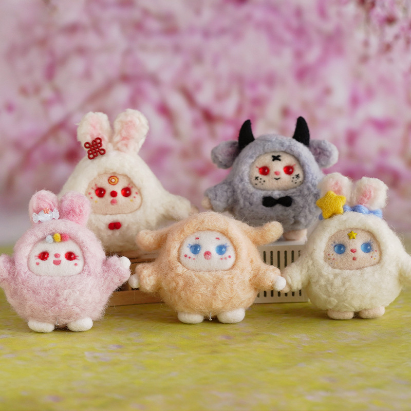 Picture of Velvet rabbit New Year Cartoon Doll wool felt pokes diy material package handmade gift pendant New Year