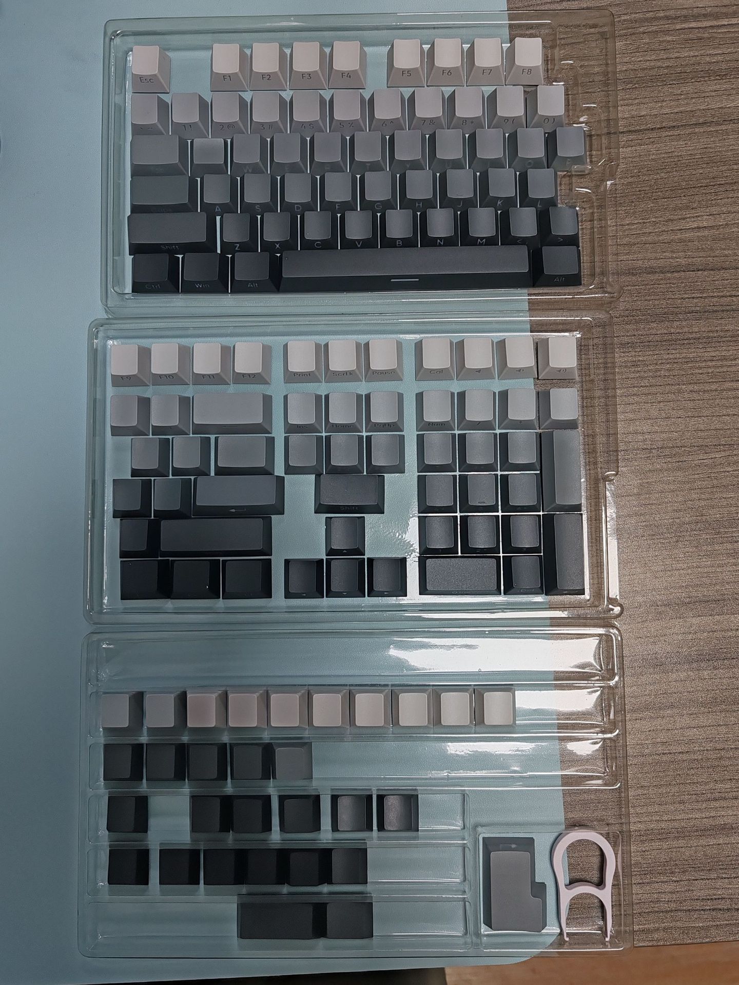 Picture of Wholesale factory height side engraved transparent keycap PBT two-color gradient large full set of sublimation personality keyboard cap